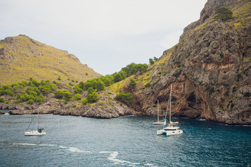 Yachts in the bay of Sa Calobra, Mallorca Majorca , Spain. © Евгений Вершинин