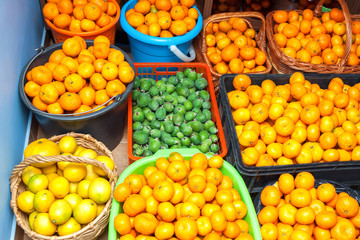 juicy ripe fruit, tangerines, lemons and feijoa