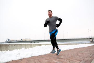 Winter running on the bank of Danube river