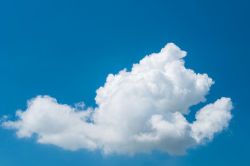 Naklejka na ściany i meble Lonely white cloud on blue sky, Bright sky and beautiful single white cloud