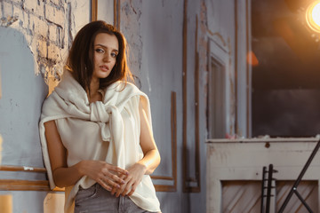 Portrait of an attractive girl on loft background