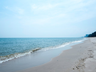 sea waves crashing at the beach