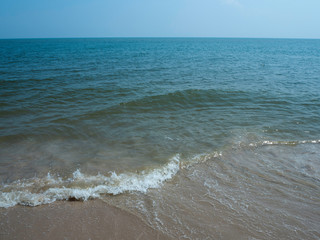 sea waves crashing at the beach