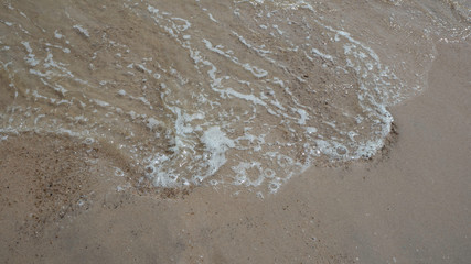 sea waves crashing at the beach