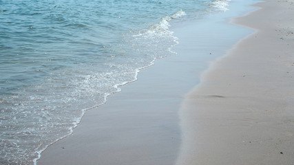 sea waves crashing at the beach