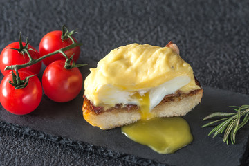 Eggs Benedict on slate tray