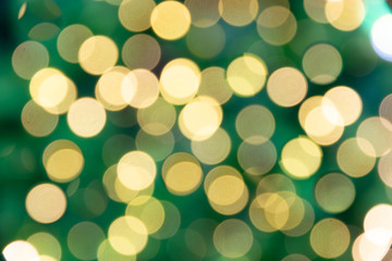 defocused light bokeh of christmas light tree,happy new year and Christmas holiday background