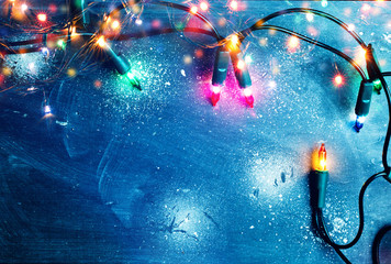 christmas lights over dark blue background