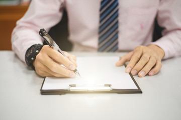 Employees are taking notes, On the desk in the company, Close up.
