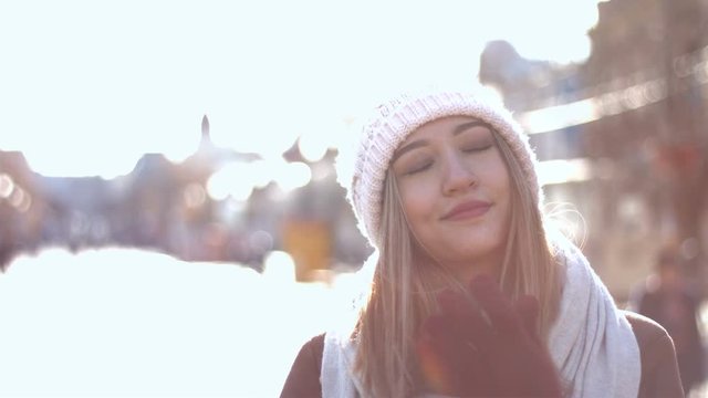 Girl on the street.
Girl stands on the Arbat, wind blows in the face. She closes eyes and dreams. Winter.