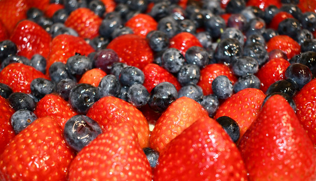Glazed berries on a fruit tart