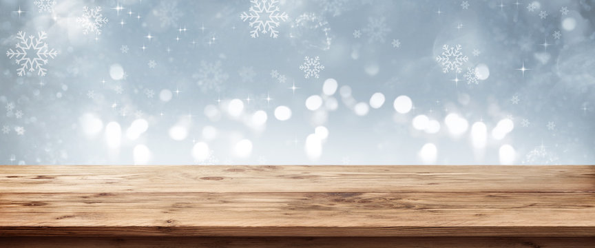 Winter background with wooden table