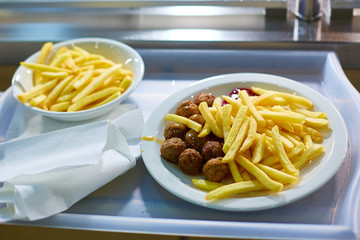 fast food restaurant. fried potatoes, meatballs.