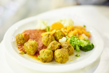 vegetable meatballs, steamed vegetables, mushroom soup. Vegetarian food, healthy food.