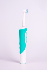 a new electric toothbrush on a white background