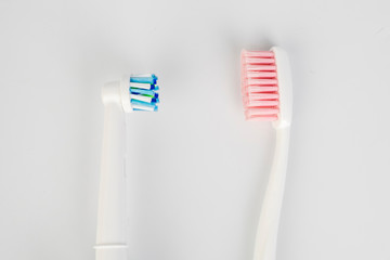 Dental concept. Toothbrush and electric toothbrush isolated.Care health, hygiene healthy.