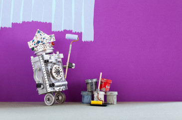 Crazy robot painter at work. Funny decorator with paint roller and buckets, purple colored room redecoration. Copy space