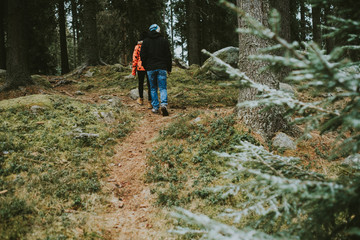 Fototapeta premium Couple hiking in the forest