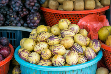 Obraz na płótnie Canvas Different fruits on a local market of Sapa in the north of Vietnam