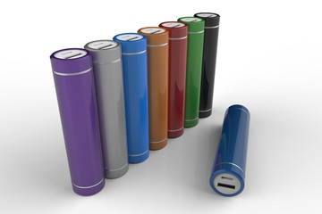 Eight colorful cylindric power banks isolated on white background. Black, green, blue, silver, orange, violet, red, white. 3D rendering
