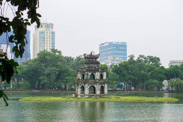 Fototapeta na wymiar Turtle tower and Sword lake in old quarter of Hanoi, Vietnam