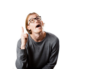 Male portrait of a fair-haired man of European appearance, on a white background. Emotions. Nerd...