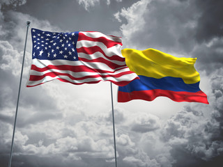 United States of America, USA & Colombia Flags are waving in the sky with dark clouds