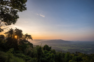 scenery during sunrise time with mountain and savannah field