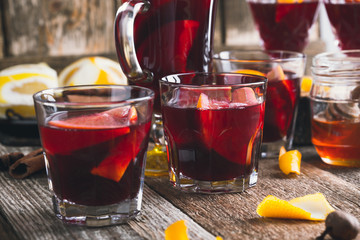 Christmas hot drinks with citrus fruits and spices, mulled wine