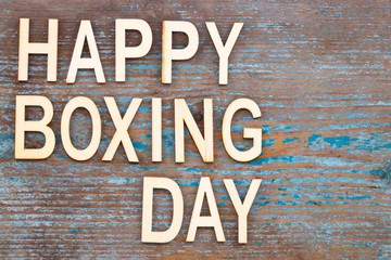 Text Happy Boxing Day word on wooden background