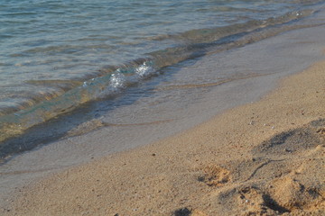 Sea waves on the sand