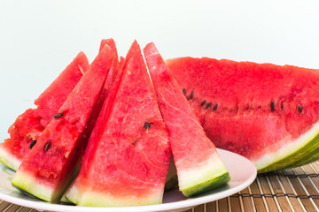 watermelon cut into fatis on table