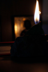 A candle with an icon