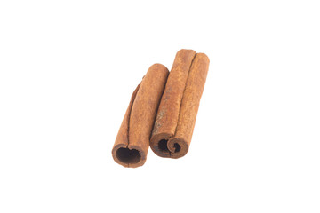 two cinnamon sticks isolated on white background