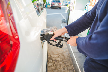 refueling car at gas station. ready for long road trip