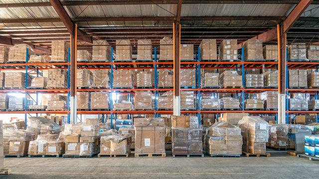 Shelf rack full of cartons at logistics warehouse