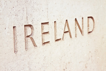 The word "Ireland" carved on stone wall - image with copy space