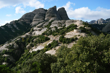 Fototapeta na wymiar Great scenery to the rocky mountains of Montserrat national park in Barcelona, Spain