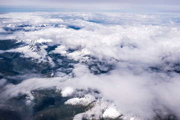 Aerial view of italian Alps with clouds