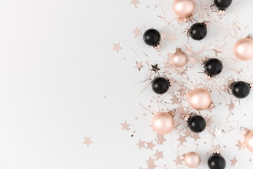 Christmas trendy composition. Xmas golden and black decorations on white background. Christmas, New Year, winter concept. Flat lay, top view, copy space 