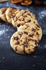 Chocolate cookies on rustic table. Chocolate chip cookies shot