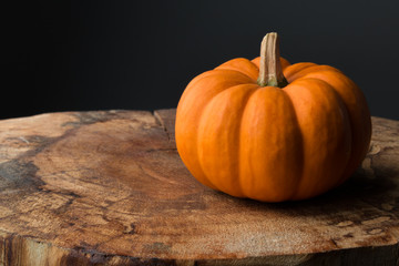 pumpkin in a wood table