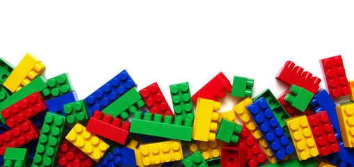 Plastic building blocks on white