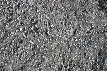 Crude asphalt road surface detail abstract close up
