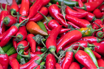 Close up group of fresh red organic spicy chilli pepper paprika in a basket at the gourmet or market.Vegetables in the tray market agriculture farm.