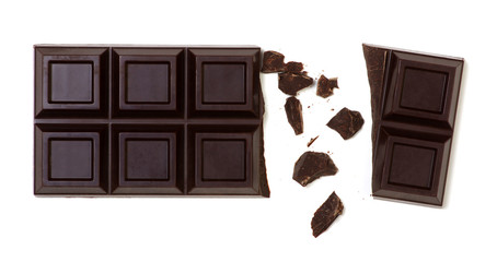 Broken chocolate bar isolated on white