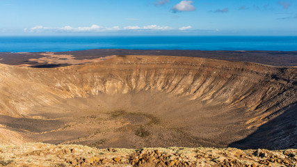 Center of Caldera Blanca volcano crater  in Lanzarote, Canary Islands, Spain. Unique volcanic landscape.
