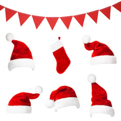 Collage with different shapes of Santa Claus hat, trianlges and stocking isolated on white...