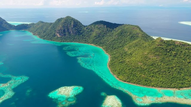 Aerial panoramic view of Pulau Bodgaya / Bohey Dulang Islands, turquoise crystal clear waters, beautiful lagoons and coral reefs of Celebes Sea - landscape panorama of Borneo, Malaysia, Pacific Ocean