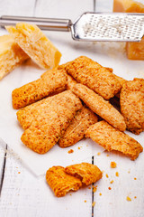 Cheese cookies on wooden rustic table. Close up